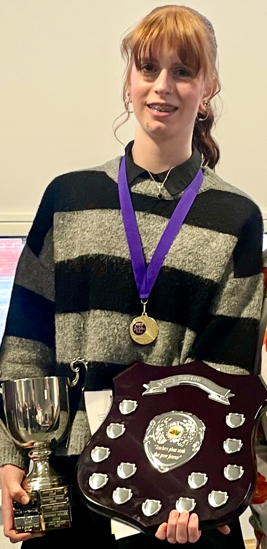 Lily, overall winner of the Speech and Drama section, with her 2026 awards.